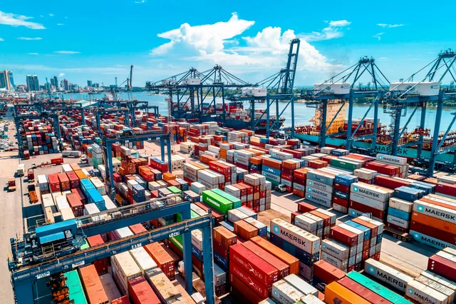 Cranes and container stacks at an international shipping terminal